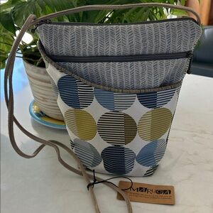 New Maruca City Girl Handbag in Eclipse Cool is a hand-crafted crossbody bag